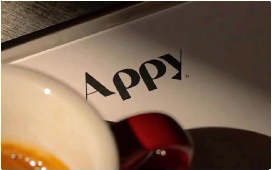 Appy Cafe wordmark next to an espresso cup