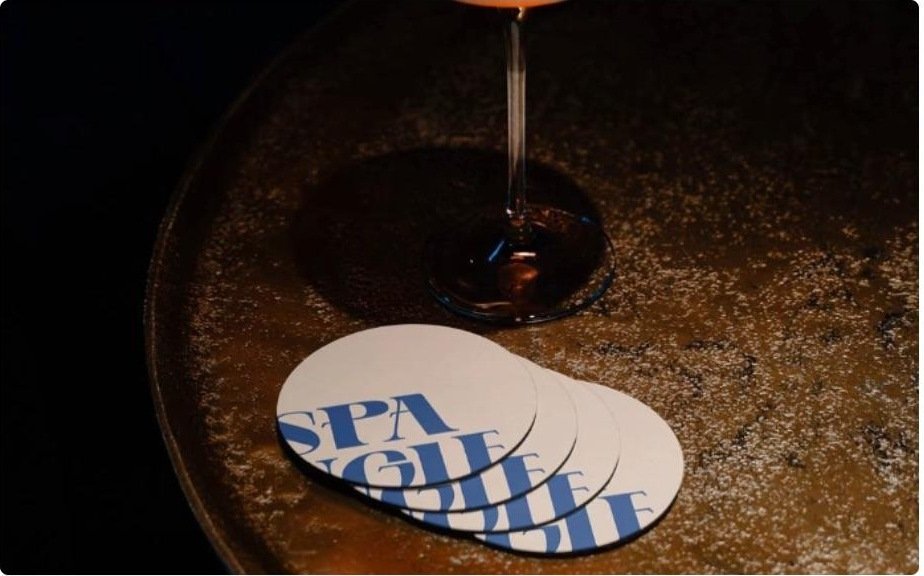Spangle coasters with royal blue lettering