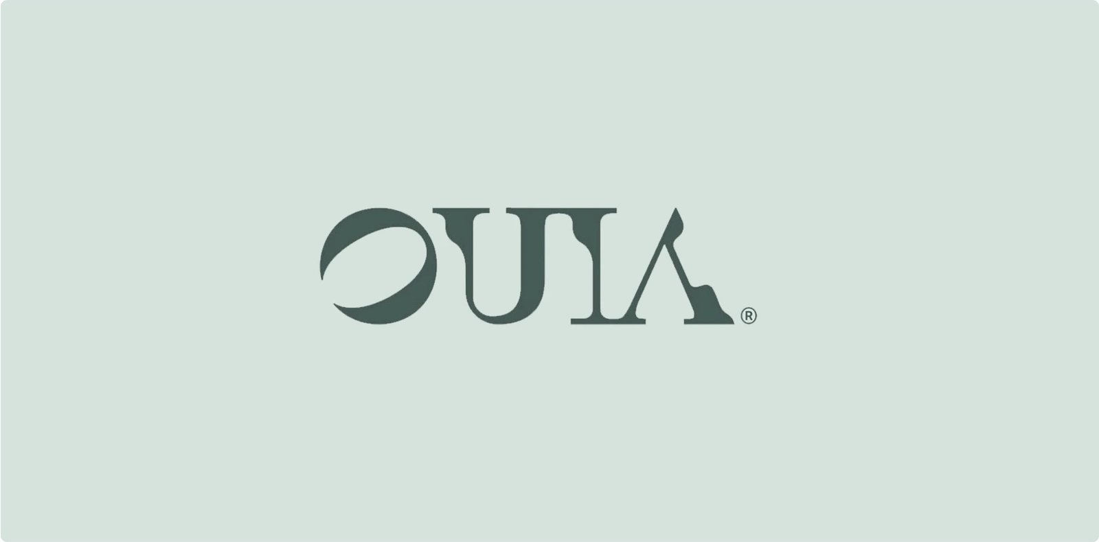 OUIA wordmark on sage green